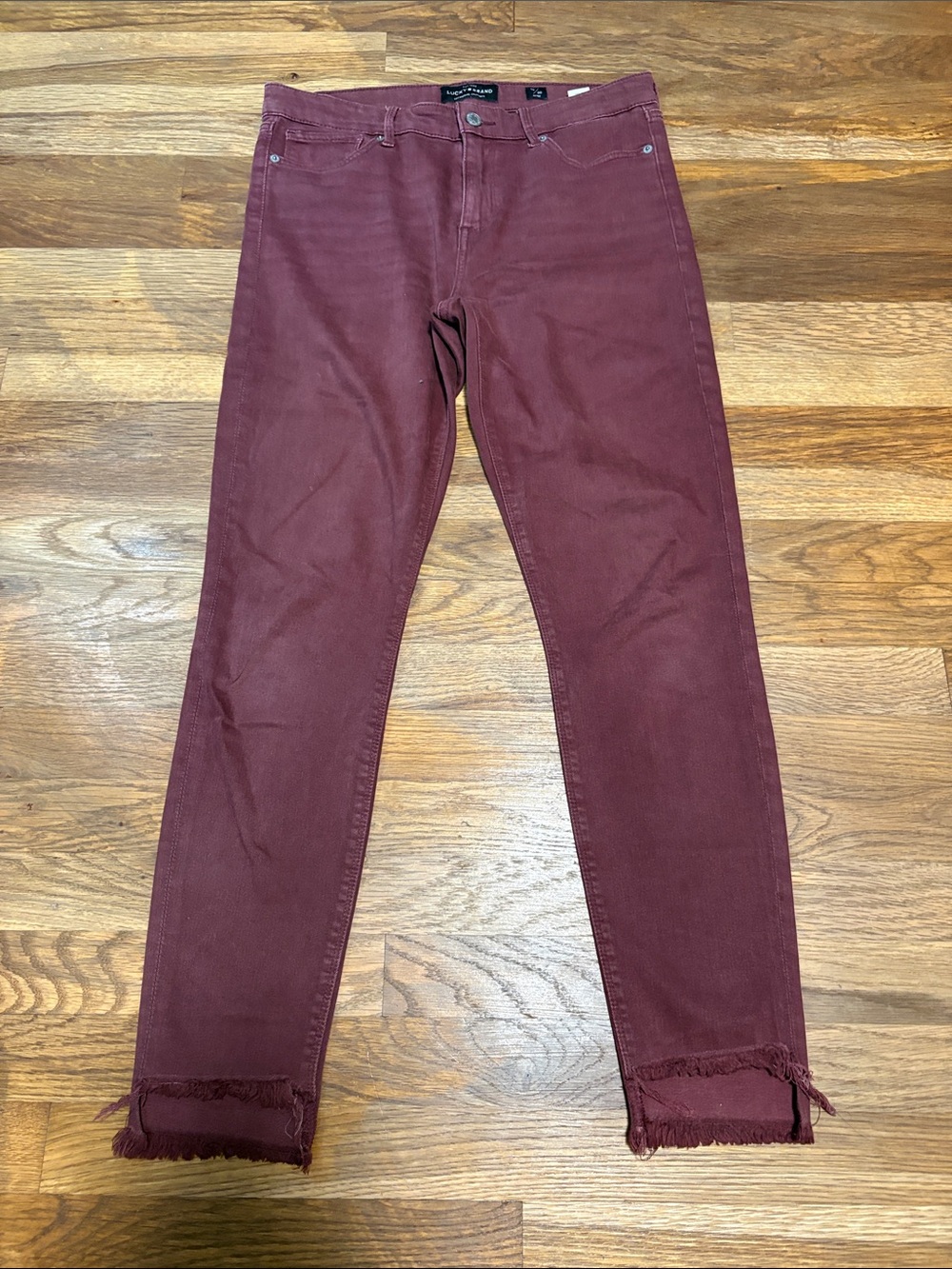 LUCKY BRAND burgundy Ava skinny jeans.